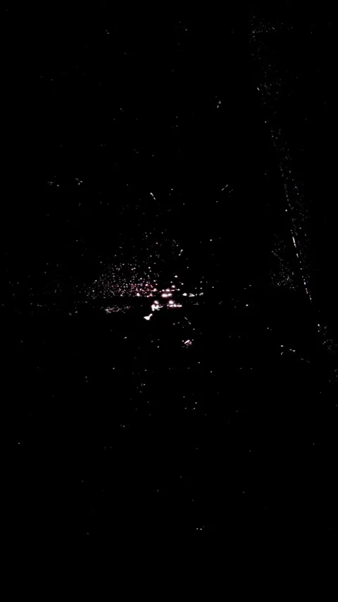 Rain drops hitting the floor on a dark night Stock Footage 285327785