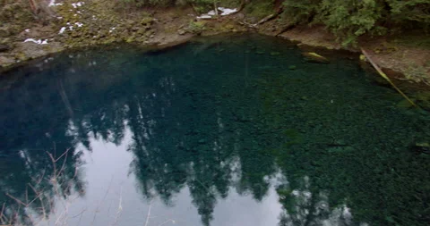 Rain drops on ice cold blue pool Stock Footage 220912288