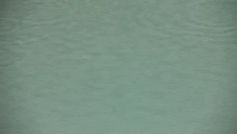 Rain drops keep falling in my pool Stock Footage 7727588