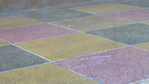 Rain drops on marble stoned wet floor during rainy season Stock Footage 143699456