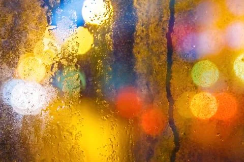Rain drops on night window Stock Photos