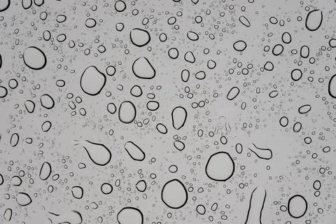 Rain drops on plain surface Stock Photos