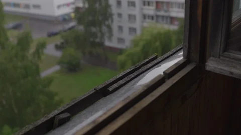 Rain drops pouring out of the window and sill - Foogy stormy weather - Block of Stock-Footage 114030706