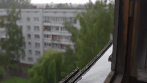 Rain drops pouring out of the window and sill - Foogy stormy weather - Block of Stock-Footage 114030709