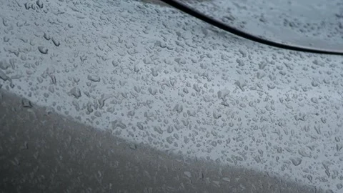 Rain drops on rear of the car, close up, abstract rain drops on car windshield 스톡 동영상 289437983