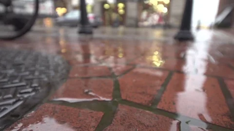 Rain Drops on a  Red Brick Road in the City Stock Footage 78760411