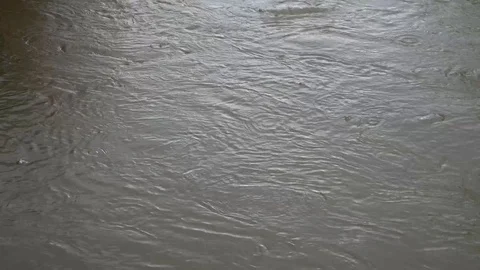 Rain drops in the river Stock Footage 107894582