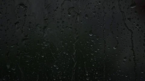Rain drops running down the window during heavy rain Stock Footage 132250002