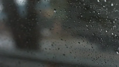 Rain drops running on window car Stock Footage 100676445