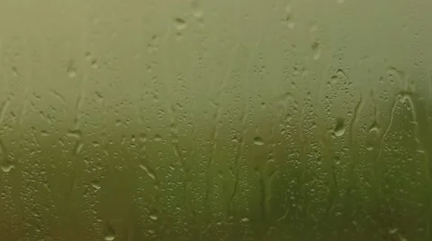 Rain drops sliding down the window glass Stock Footage 52661496