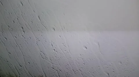 Rain drops sliding down the window glass 库存影片 52921897