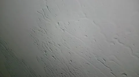 Rain drops sliding down the window glass Stock Footage 52921902