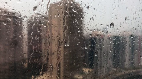 Rain drops sliding on the window Stock Footage 120742300