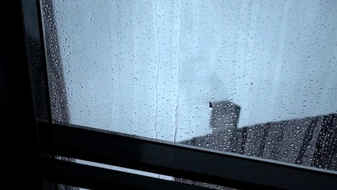 Rain drops slowly flow down the transparent roof window, close-up Stock-Footage 85020663