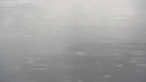 Rain drops on smooth gray lake surface, 3 crops, various shades of gray Stock Footage 271650241