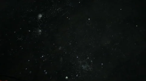 Rain drops splashing in puddle Видео 46641449