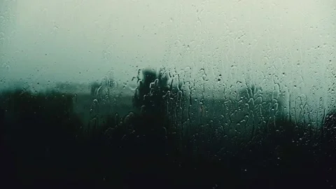 Rain drops strike window pane Stock Footage 111278297