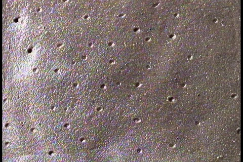 Rain drops striking wet sand. Stock Footage 86752371