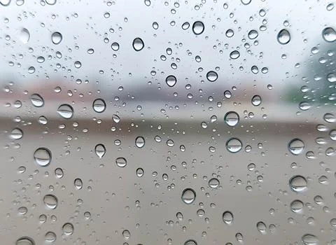 Rain Drops  texture on glass surface Stock Photos