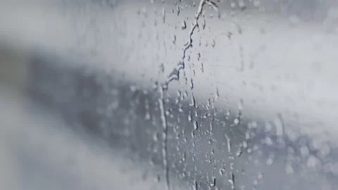 Rain drops on train window. Blurred background. Stock Footage 146232713