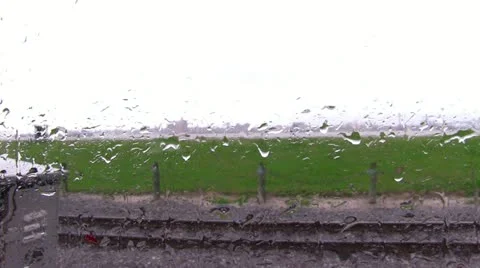 Rain drops on train window stationary Stockbeeldmateriaal 10833010