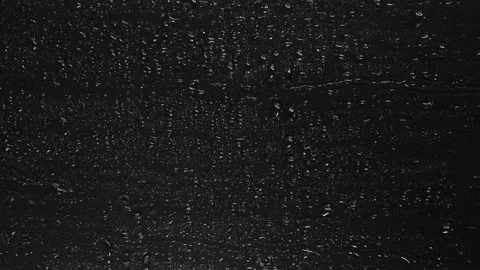 Rain Drops trickling down isolated on black background. Vídeo Stock 138539543