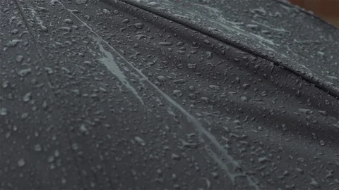 Rain drops on umbrella - Extreme close up Stock Footage 93208370