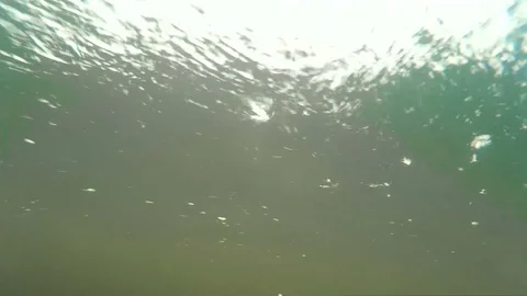 Rain drops underwater Stockbeeldmateriaal 79622849