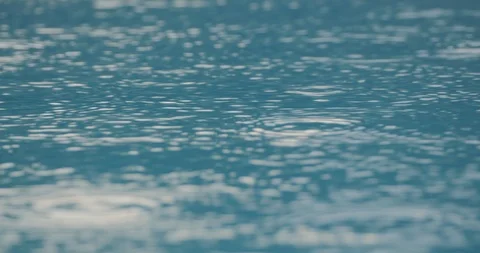 Rain drops in the water Stock Footage 90106643