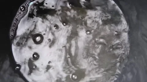 Rain drops on water in raining day Stock Footage 276278277