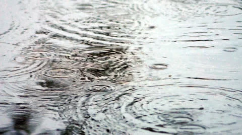 Rain Drops on water surface Stock Footage 24518450