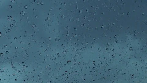 Rain drops on a window 01 (color graded) 스톡 동영상 75640180