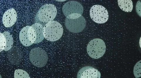 Rain drops on the window, and defocused city lights, high quality  Stock Footage 58812774
