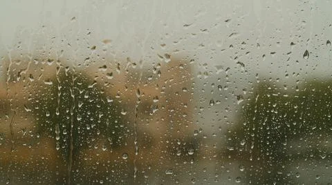 Rain Drops On Window. Atmospheric Effect With Raindrops Stock Photos