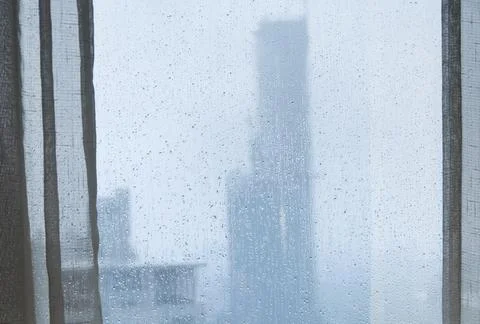Rain drops on a window background Stock Photos