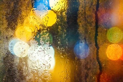Rain drops on window with blurry background Stock-Fotos