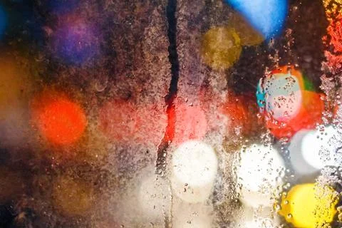 Rain drops on window with blurry background Foto stock