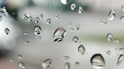 Rain drops on window. Bubbles on glass. Window after rain Stock Photos