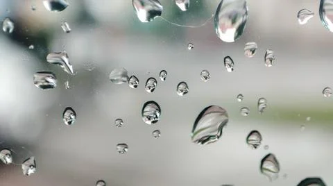 Rain drops on window. Bubbles on glass. Window after rain Stock Photos
