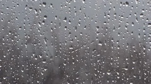 Rain drops on window Stock Footage 12619918