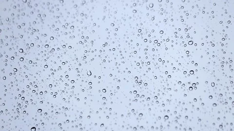 Rain drops on a window Stock Footage 220078424