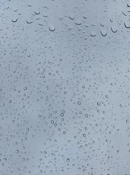 Rain drops on window full frame Stock Photos