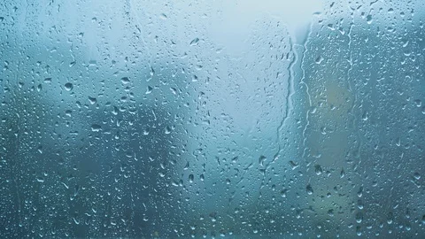 Rain drops on window glass 1 Stock Footage 121179286