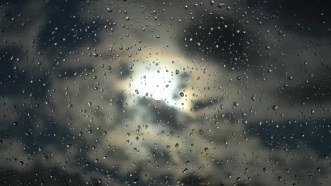 Rain drops on the window glass with dramatic sky Stock Footage 255697518