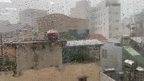 Rain Drops On The Window Glass During A Heavy Rain With Strong Wind Stock Footage 134384692