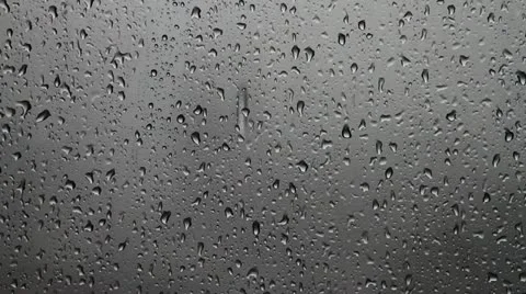 Rain drops on window glass Stock Footage 11477990