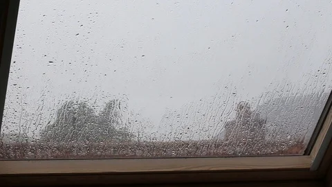 Rain drops on window glass Stock Footage 129309688