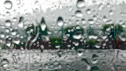 Rain drops on window glass Stock Footage 296143288