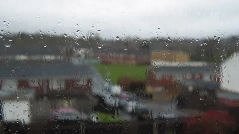 Rain Drops On Window Glass In Monsoon Season. Water Drips Flow Down Blurry Stock Footage 177667445
