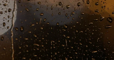 Rain drops on window glass at night Stock Footage 146756194